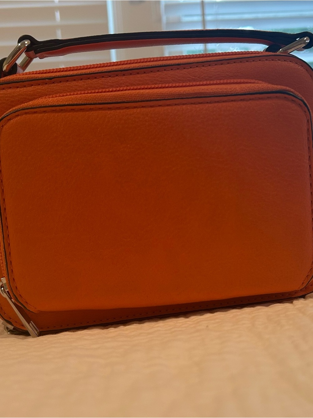 K. Carroll Compact Orange Crossbody Bag with RFID protection